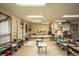 Classroom with sink and multiple tables and chairs at 461 Tyler Ave, Louisville, CO 80027