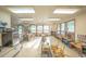Bright classroom featuring several student desks and a kitchenette area at 461 Tyler Ave, Louisville, CO 80027
