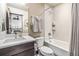 Clean bathroom with a shower/tub combo, vanity with a quartz countertop, and a modern toilet at 378 River Park Dr, Breckenridge, CO 80424