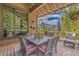 Enjoy mountain views from this deck with a bistro table and chairs at 378 River Park Dr, Breckenridge, CO 80424
