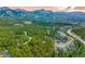 Luxury homes nestled in a wooded mountain community at 378 River Park Dr, Breckenridge, CO 80424