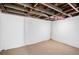 Unfinished basement offering ample storage space at 2801 W Dartmouth Ave, Denver, CO 80236