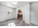 Cozy dining area with an archway leading to the kitchen at 2801 W Dartmouth Ave, Denver, CO 80236