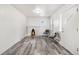 Bright living room with fireplace and hardwood floors at 2801 W Dartmouth Ave, Denver, CO 80236