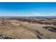 Wide shot of open land with distant views of a city at 1705 Peridot Ct, Castle Rock, CO 80108