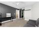 Spacious bedroom with built-in shelving and a desk at 1705 Peridot Ct, Castle Rock, CO 80108