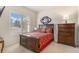 Cozy bedroom with hardwood floors and large windows at 6236 Oxford Peak Ln, Castle Rock, CO 80108