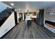 Modern kitchen with island, stainless steel appliances, and fireplace at 147 Illinois Gulch Rd # 4, Breckenridge, CO 80424