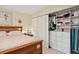 King-size bed and built-in closet in this bedroom at 9340 E Center Ave # 2C, Denver, CO 80247