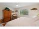 Bedroom with king-size bed and ample closet space at 9340 E Center Ave # 2C, Denver, CO 80247