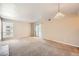 Living room with neutral color walls, carpeted floors and fireplace at 14904 E Hampden Cir # C7, Aurora, CO 80014