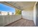 Private balcony with wood deck flooring at 14904 E Hampden Cir # C7, Aurora, CO 80014