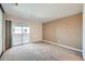 Bedroom with private balcony access at 14904 E Hampden Cir # C7, Aurora, CO 80014