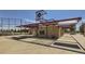 Baseball field concession stand with a red awning and concrete area at 2058 S Haleyville Way, Aurora, CO 80018