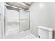 Bathroom with shower/tub combo and tile flooring at 6864 Woodchuck Way, Evergreen, CO 80439