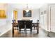 Bright dining room with a large table and ample seating at 7373 E Iowa Ave # 1101, Denver, CO 80231
