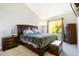 Comfortable bedroom with a king-size bed and plenty of closet space at 7373 E Iowa Ave # 1101, Denver, CO 80231