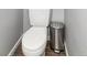 Simple bathroom with toilet and trash can at 7373 E Iowa Ave # 1101, Denver, CO 80231