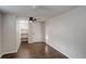 Spacious basement bedroom with dark hardwood floors at 550 Winona Ct, Denver, CO 80204