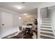 Finished basement area with desk and hardwood floors at 550 Winona Ct, Denver, CO 80204