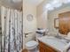 Clean bathroom with shower/tub and updated vanity at 6590 Ridgeview Dr, Morrison, CO 80465