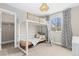 Bedroom with built-in bunk beds and window at 916 Shavano Peak Dr, Superior, CO 80027