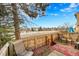 Private backyard with deck, seating area, and view at 1199 S Waco St # E, Aurora, CO 80017
