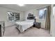 Bright bedroom with double bed and ample closet space at 1199 S Waco St # E, Aurora, CO 80017