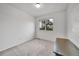 Simple bedroom with carpeted floor and window at 1199 S Waco St # E, Aurora, CO 80017