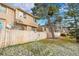 Tan two-story home with fenced backyard at 1199 S Waco St # E, Aurora, CO 80017