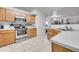Kitchen with stainless steel appliances and wood cabinets at 1199 S Waco St # E, Aurora, CO 80017
