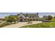 Community clubhouse with golf cart rentals and expansive green space at 22036 E 39Th Pl, Aurora, CO 80019