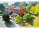 Large brick home situated on a spacious lot with mature trees at 965 N Pennsylvania St, Denver, CO 80203