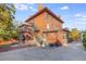 Large backyard with patio, exterior staircase, and detached structure at 965 N Pennsylvania St, Denver, CO 80203