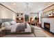Spacious bedroom with fireplace and large windows at 965 N Pennsylvania St, Denver, CO 80203