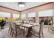 Bright dining room with large windows and seating for six at 965 N Pennsylvania St, Denver, CO 80203