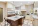 Modern kitchen with large island and stainless steel appliances at 965 N Pennsylvania St, Denver, CO 80203
