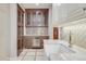 Butler's pantry with wine cooler and additional sink at 965 N Pennsylvania St, Denver, CO 80203