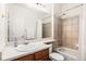 Clean bathroom with a shower/tub combo and updated vanity at 17393 E Lake Pl, Aurora, CO 80016