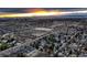 Aerial view of a residential area with snow-covered homes and landscape at 3318 S Dayton Ct, Denver, CO 80231