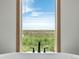 Bathroom with a view from the tub at 15 S County Road 197, Byers, CO 80103