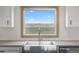 Farmhouse sink with a view of the open fields at 15 S County Road 197, Byers, CO 80103