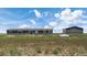 Ranch-style home with detached garage at 15 S County Road 197, Byers, CO 80103