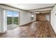 Bright living room with sliding glass doors leading to a patio at 15 S County Road 197, Byers, CO 80103