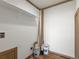 Laundry room with shelving for storage at 15 S County Road 197, Byers, CO 80103