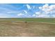 Aerial view showing a house and large acreage at 15 S County Road 197, Byers, CO 80103