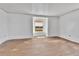Empty bedroom with hardwood floors and a window at 4550 Miller St, Wheat Ridge, CO 80033