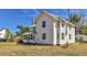 Two-story white house with a large yard at 4550 Miller St, Wheat Ridge, CO 80033