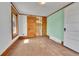Bedroom with hardwood floors and light green walls at 4550 Miller St, Wheat Ridge, CO 80033