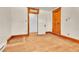 Empty bedroom with hardwood floors and wooden trim at 4550 Miller St, Wheat Ridge, CO 80033